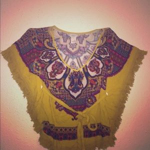 Unusual summer blouse, ties around waist.